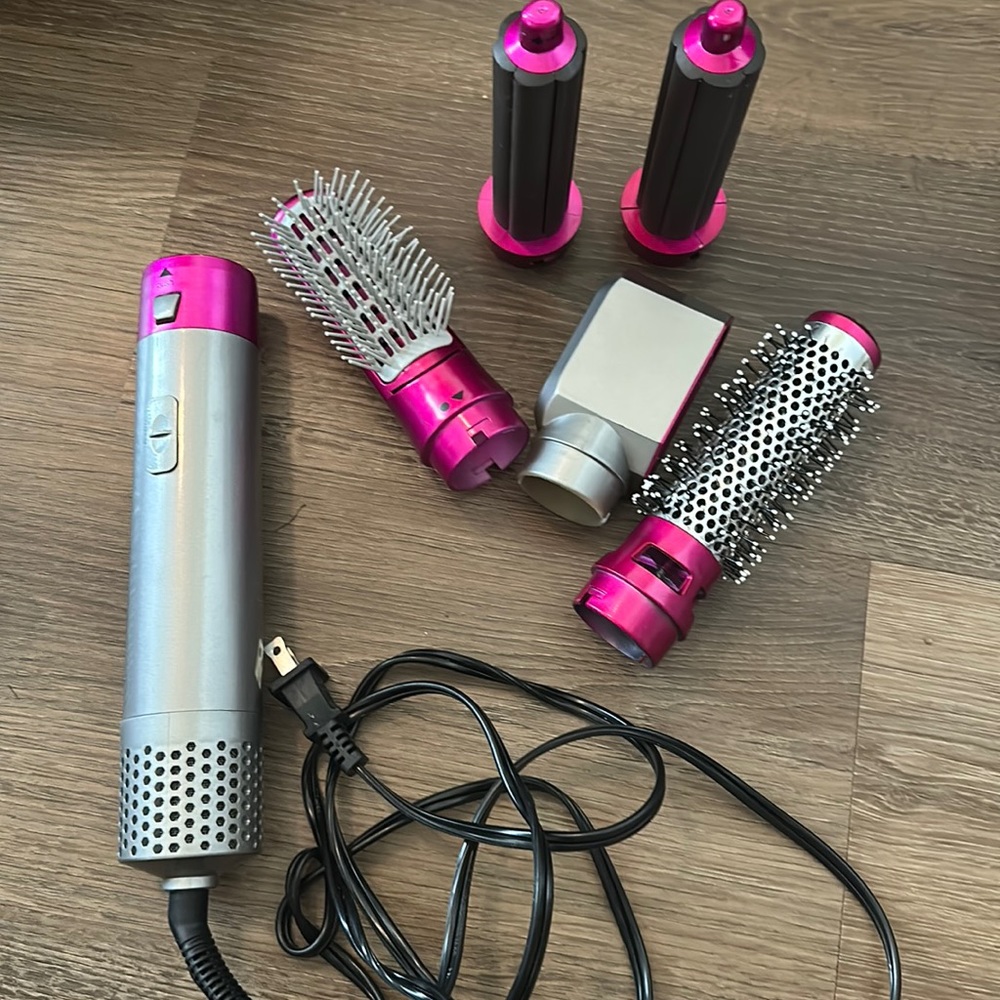 Hair dryer with multiple attachments